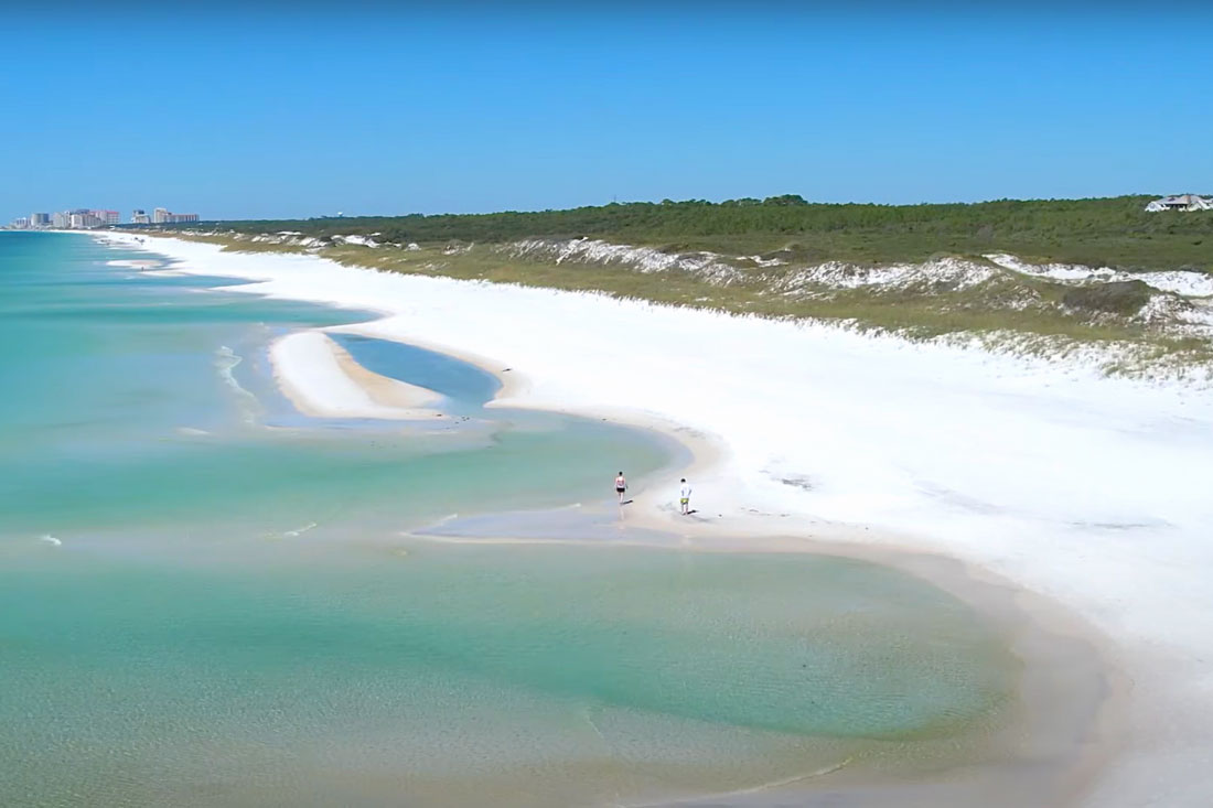 Discover the secluded beaches and vibrant marine life at Topsail Hill.